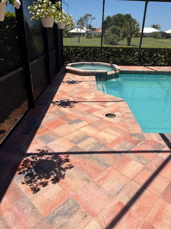 Coral coloured pool deck pavers, cleaned and sealed