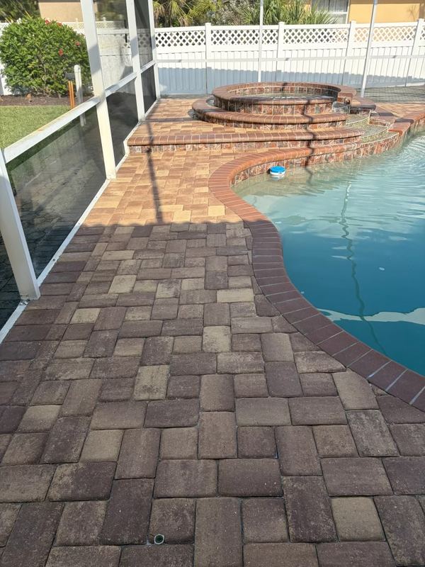 Pool deck and raised spa surround after sealing